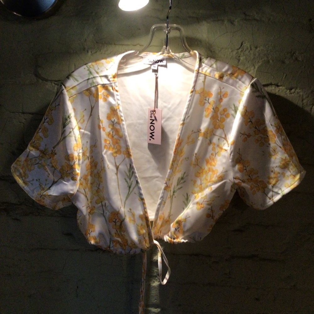 The “Now “marigold crop tie top